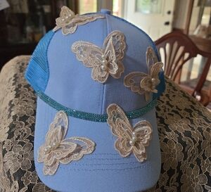 Blue Cap with Lace Butterfly Accents